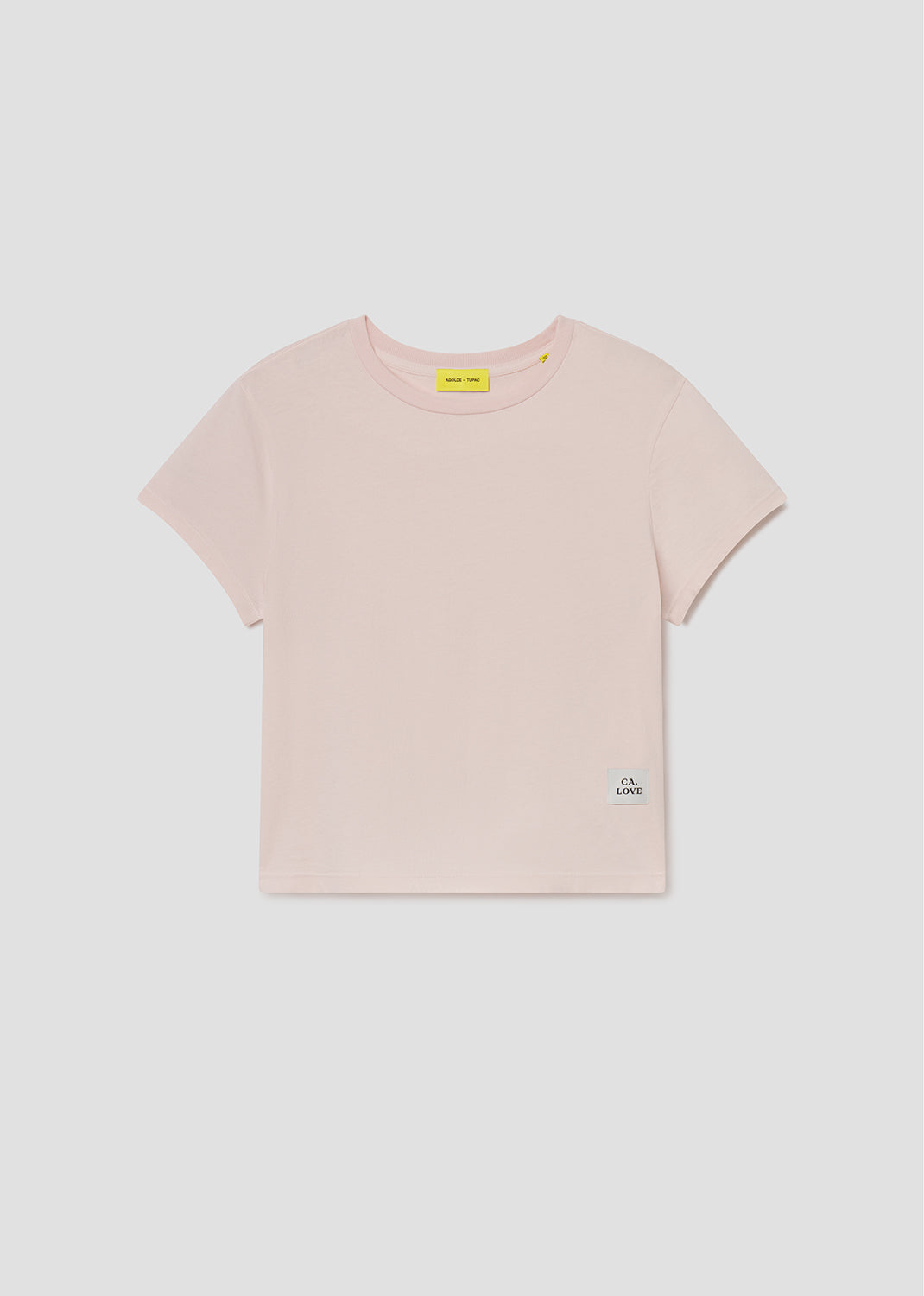 Pink t-shirt with brand logos on a light gray background