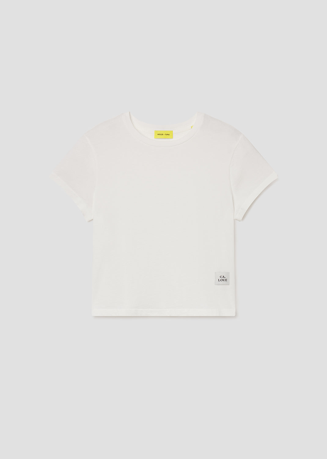 White t-shirt with a small logo on a white background
