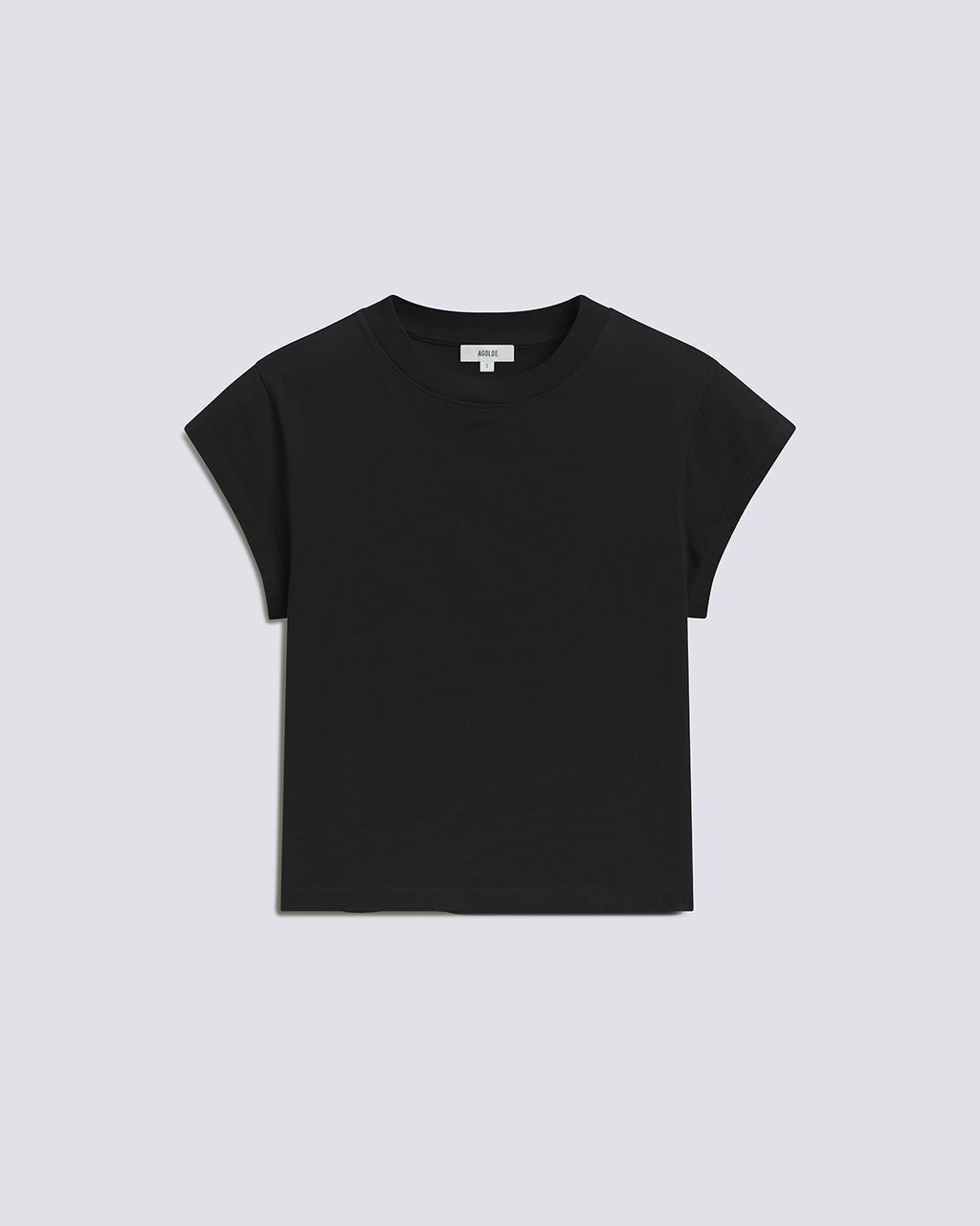 A black short-sleeve crewneck t-shirt laid flat against a light gray background.