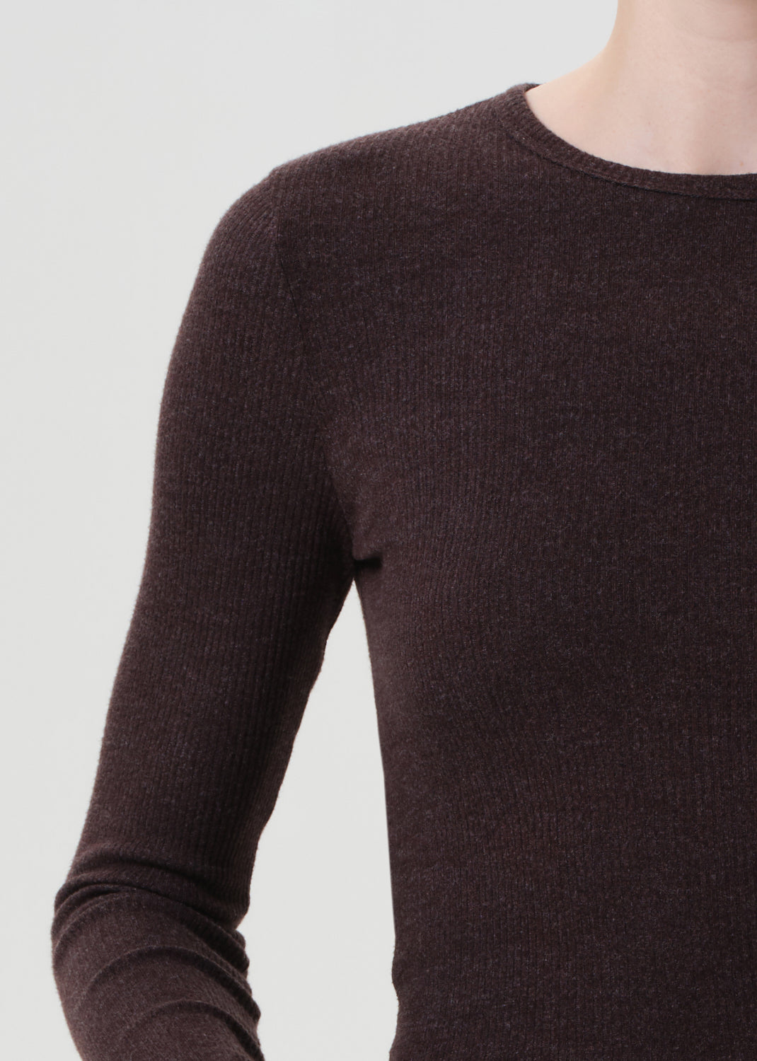 Brown long-sleeve shirt on a light gray background