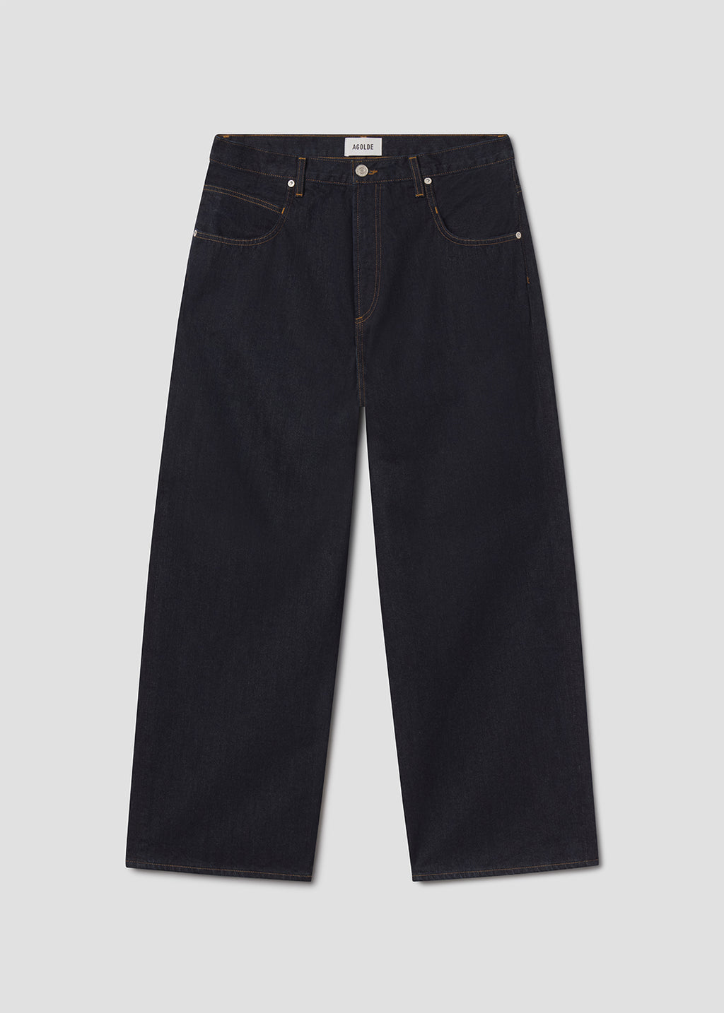 Dark blue jacket and jeans on a grey background