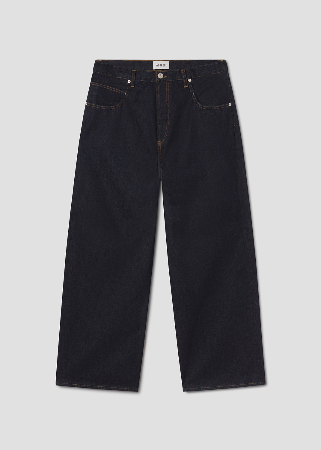 Dark blue jacket and jeans on a grey background