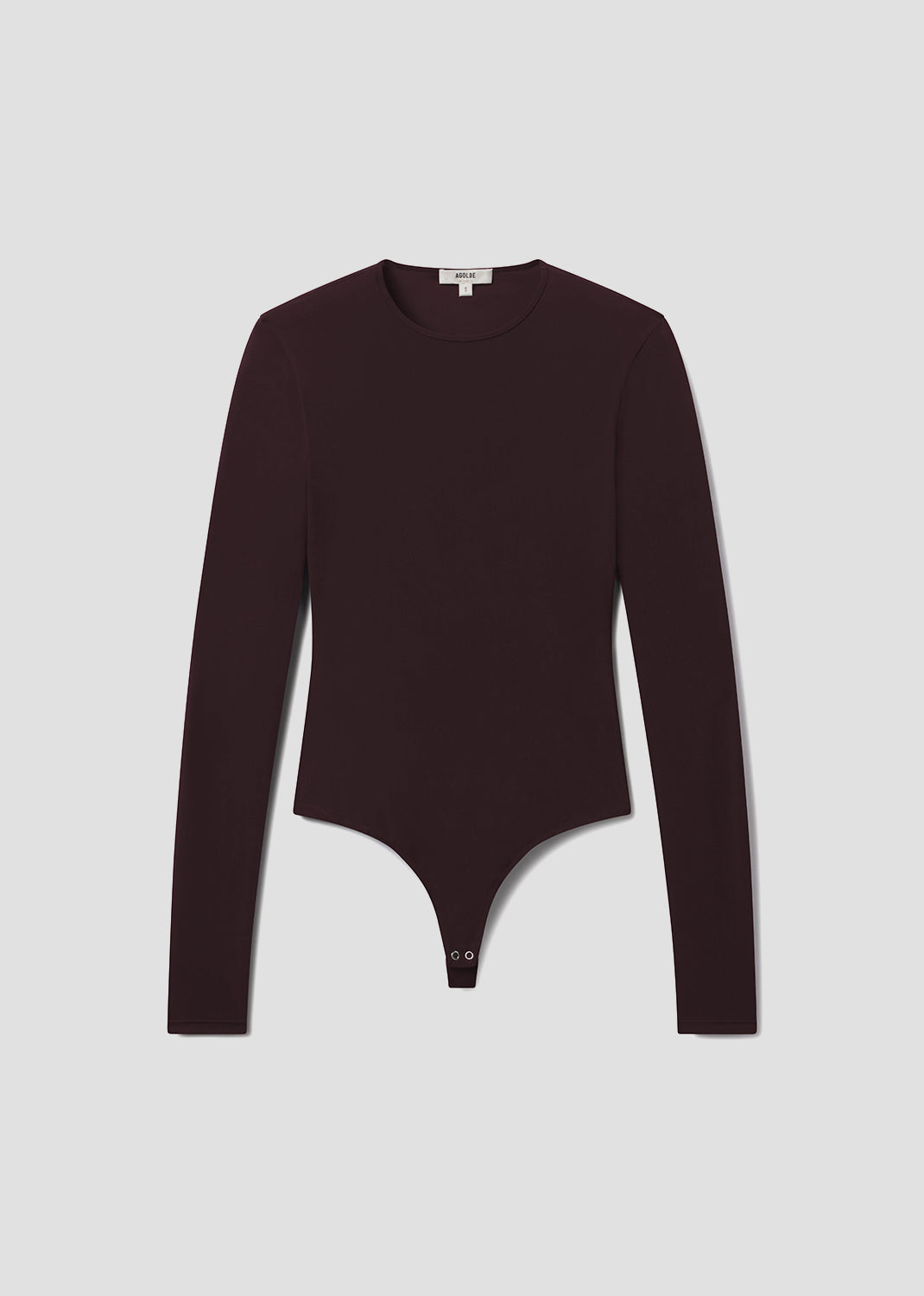 Black bodysuit on a light gray background