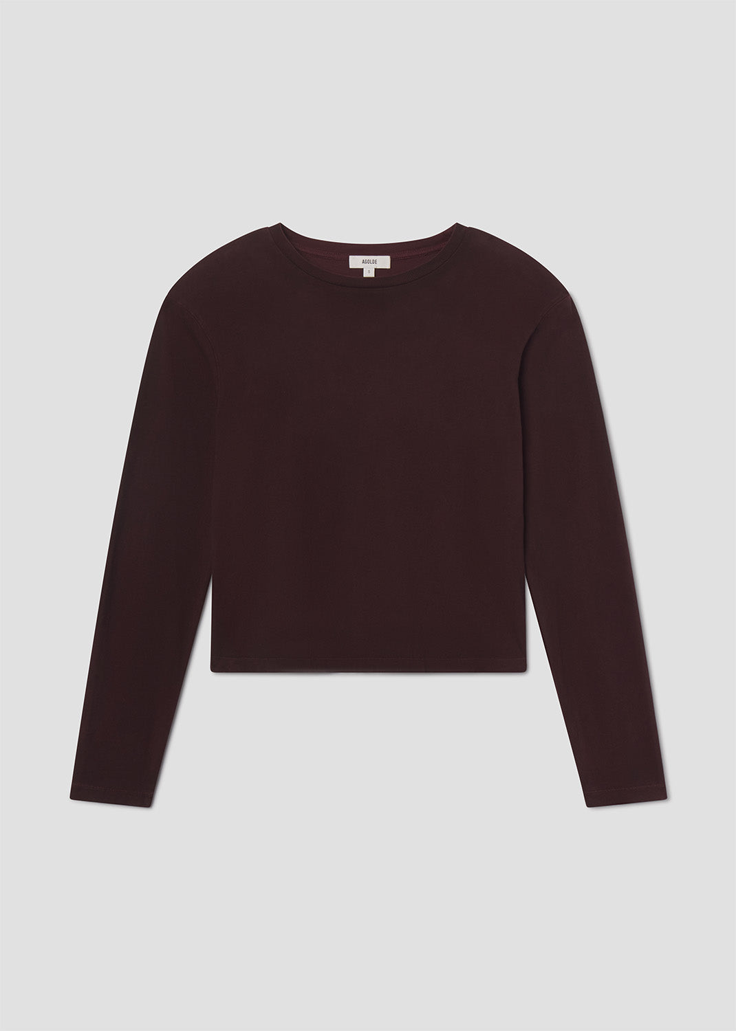Brown sweater on a light gray background