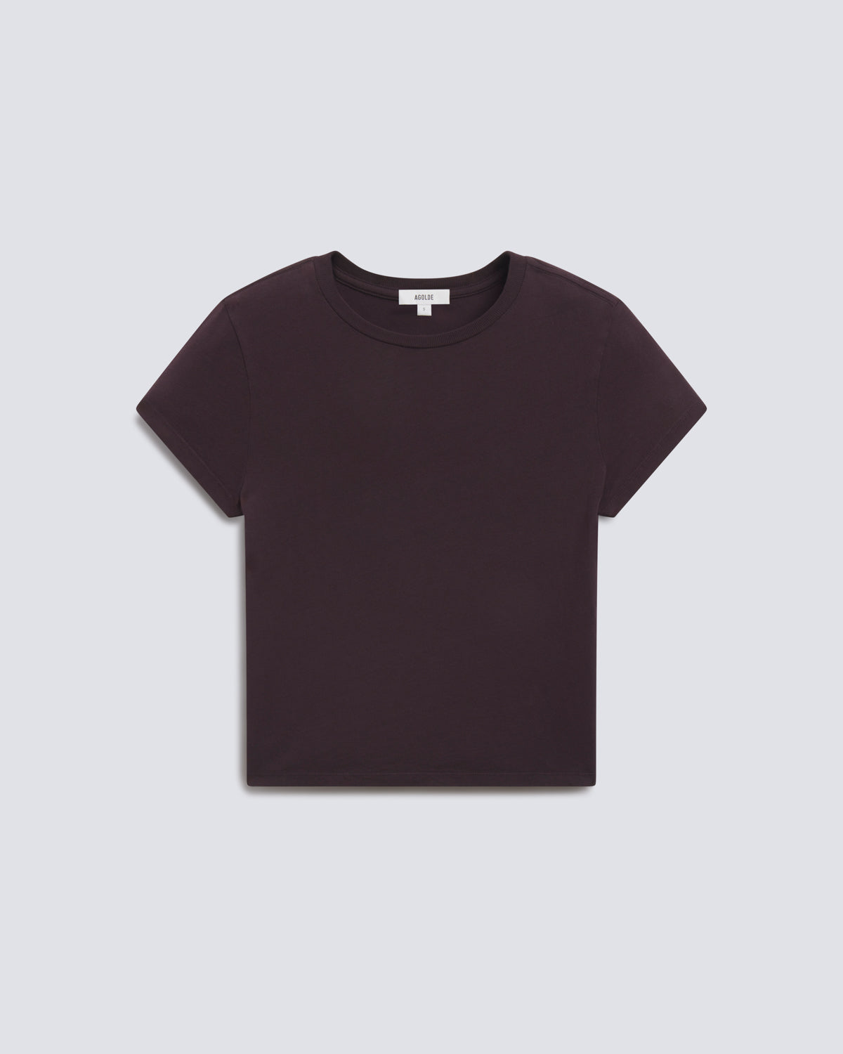 A dark plum purple short-sleeve crewneck t-shirt laid flat against a light gray background.