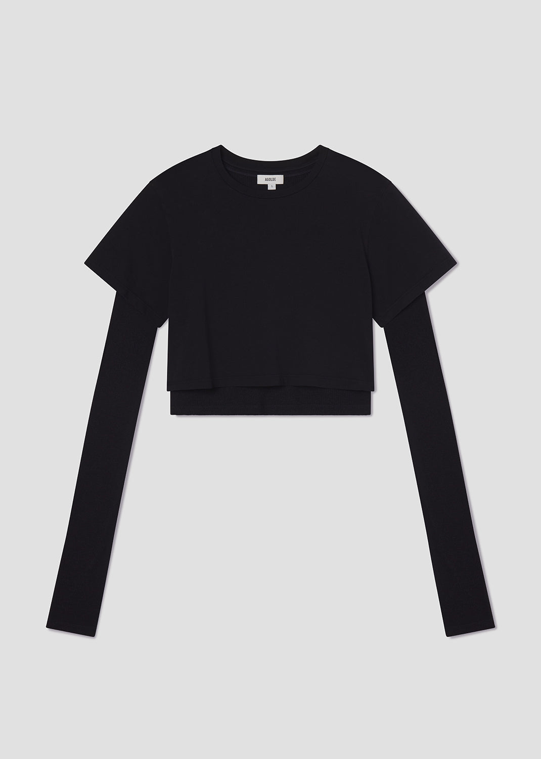 Black long-sleeve crop top on a light gray background