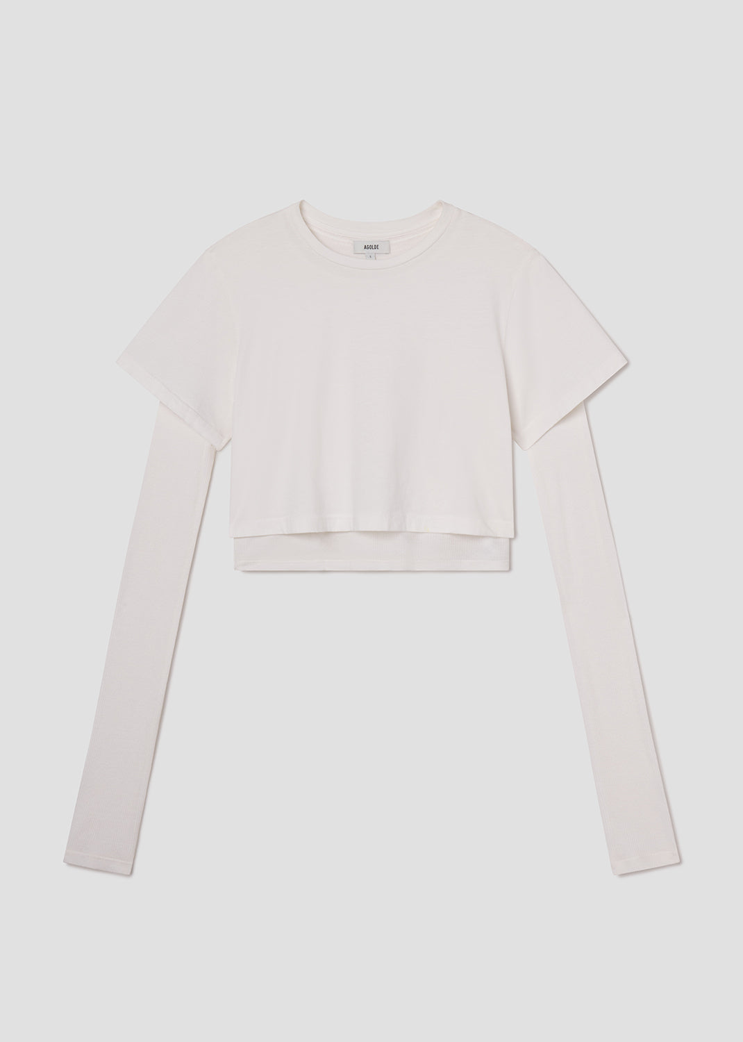 Light beige long-sleeve top on a white background