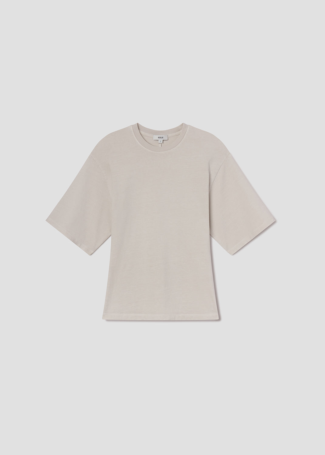 Beige t-shirt on a white background