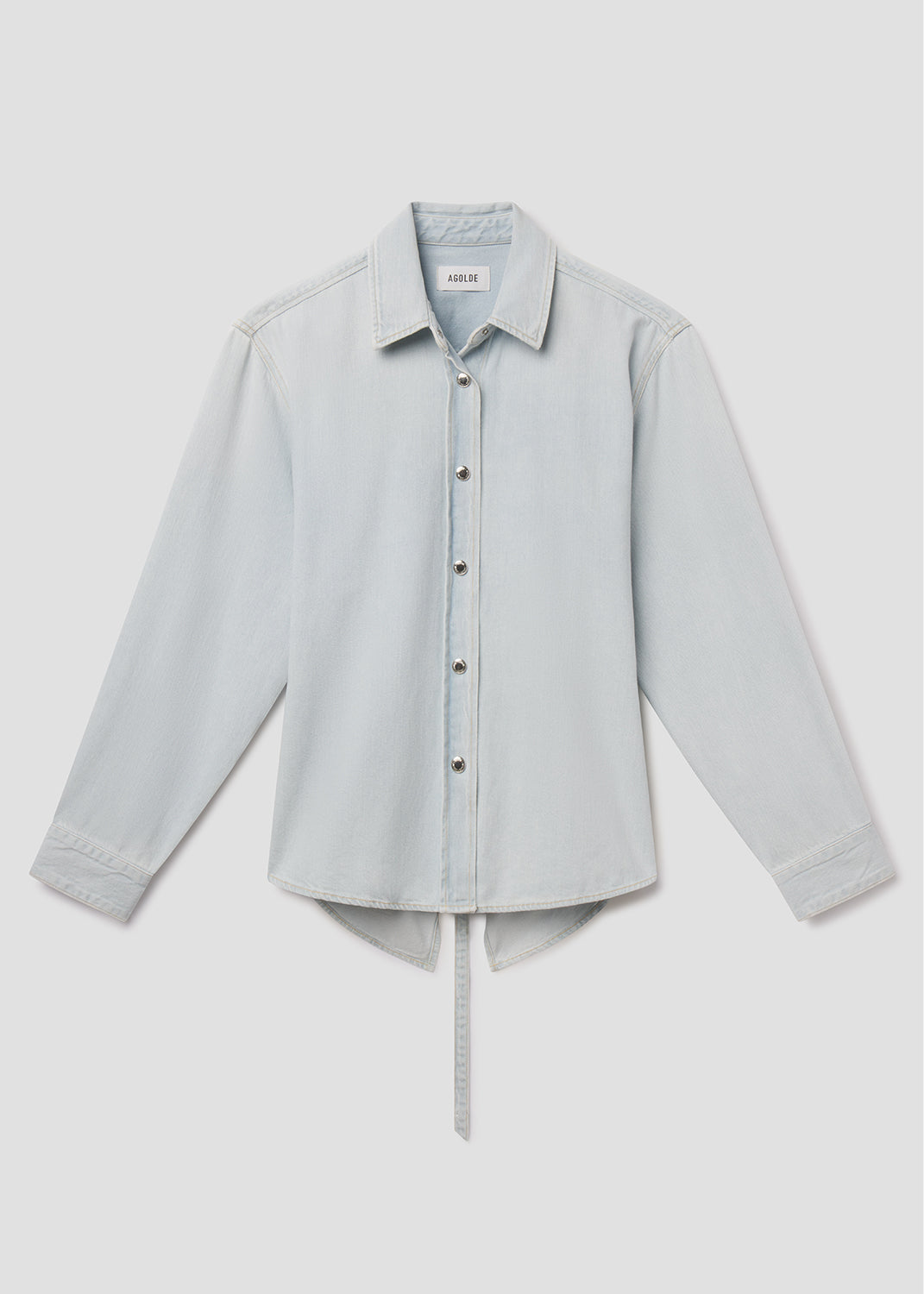 Light blue shirt on a light gray background