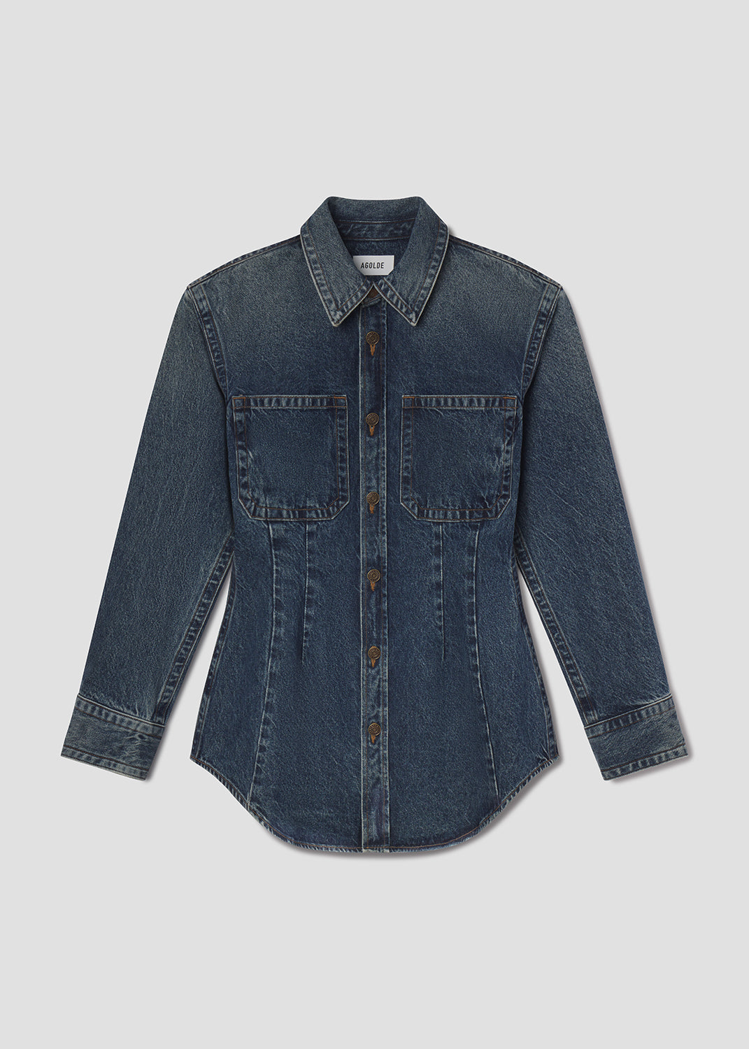 Blue denim shirt on a light gray background