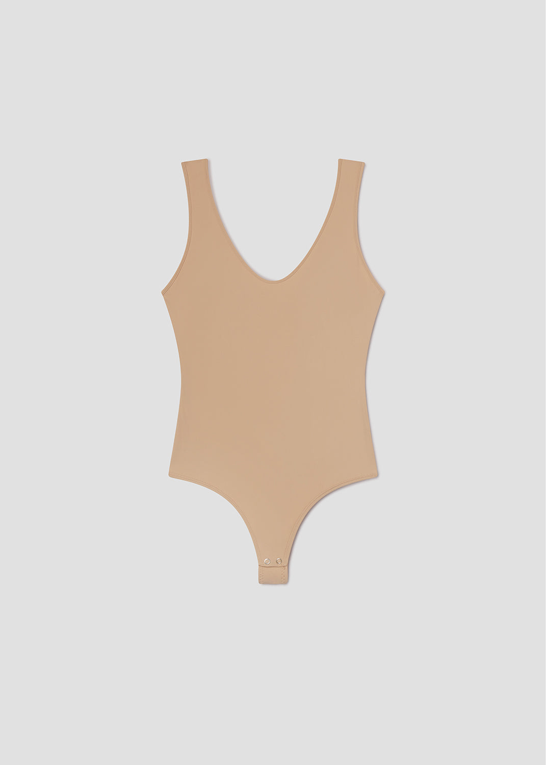 Beige swimsuit on a light gray background