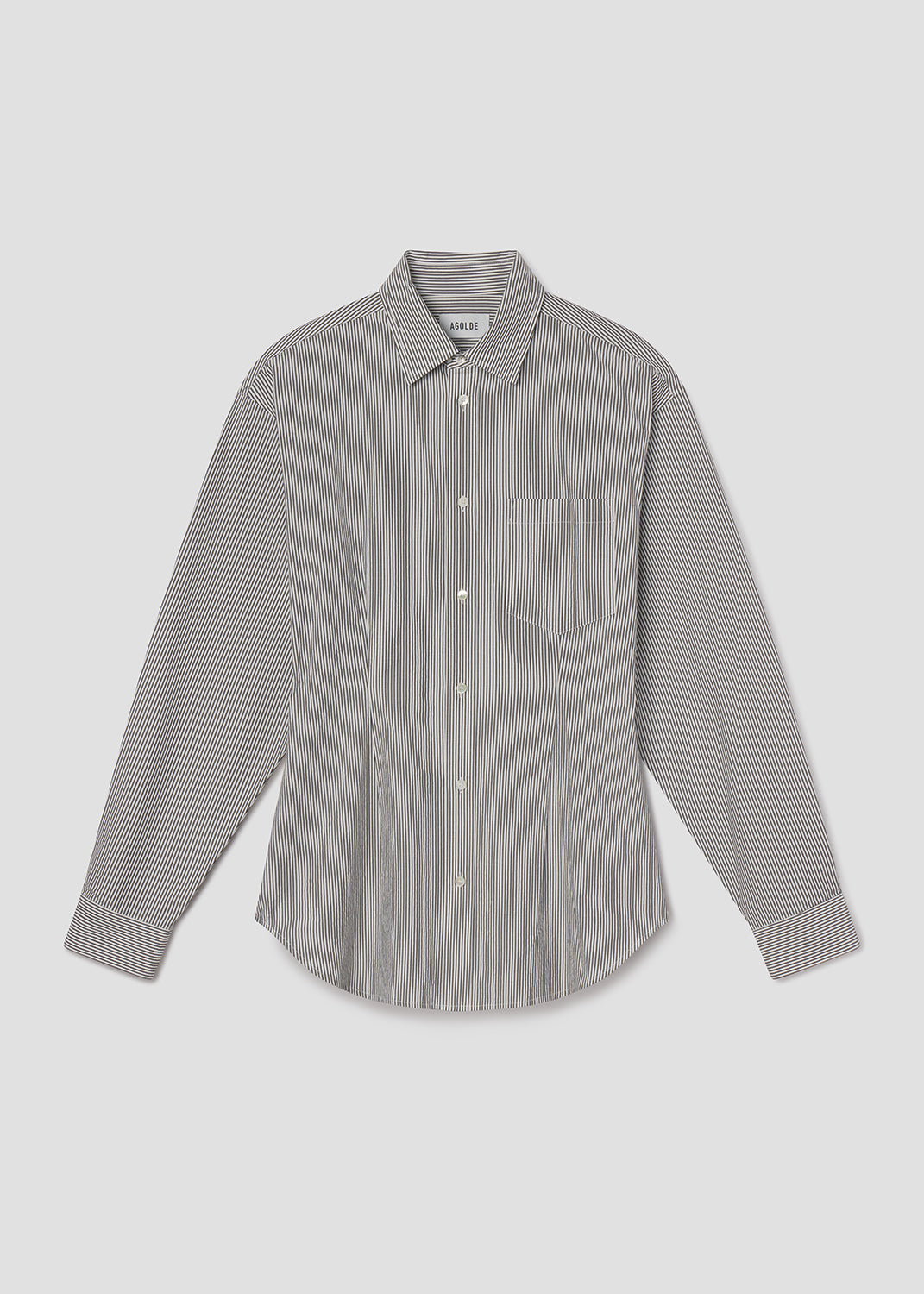 Gray checkered shirt on a light gray background