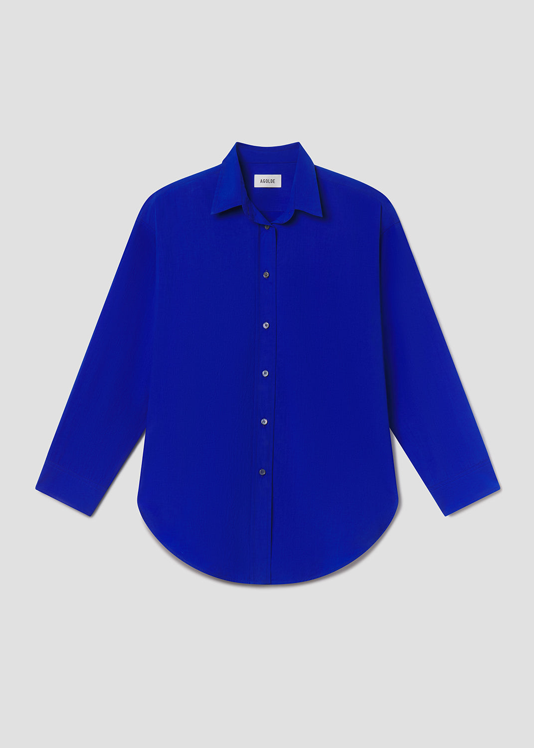 Blue shirt on a light gray background