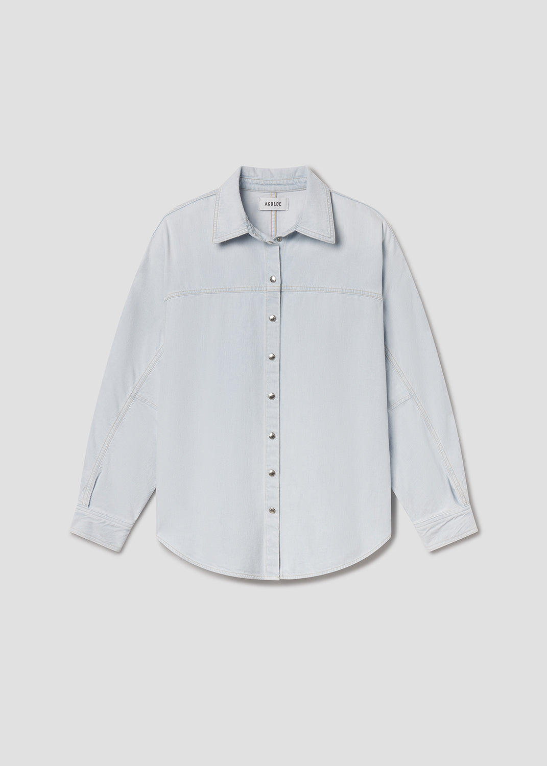 Light blue shirt on a light gray background