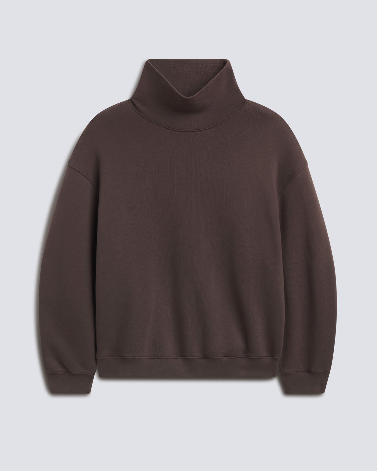A dark brown turtleneck sweatshirt with a relaxed fit, displayed against a light gray background.
