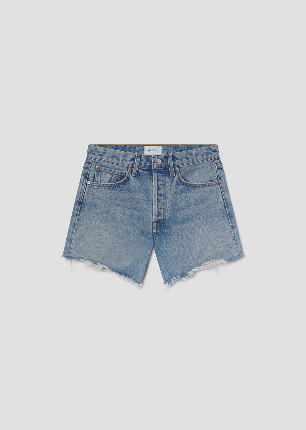 Blue denim shorts on a light gray background