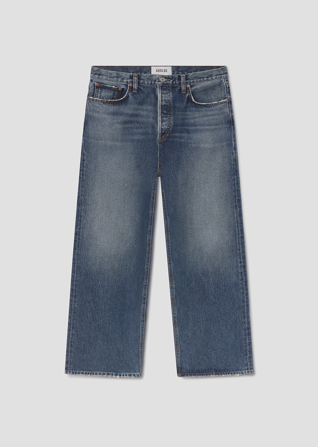 Blue jeans on a light gray background