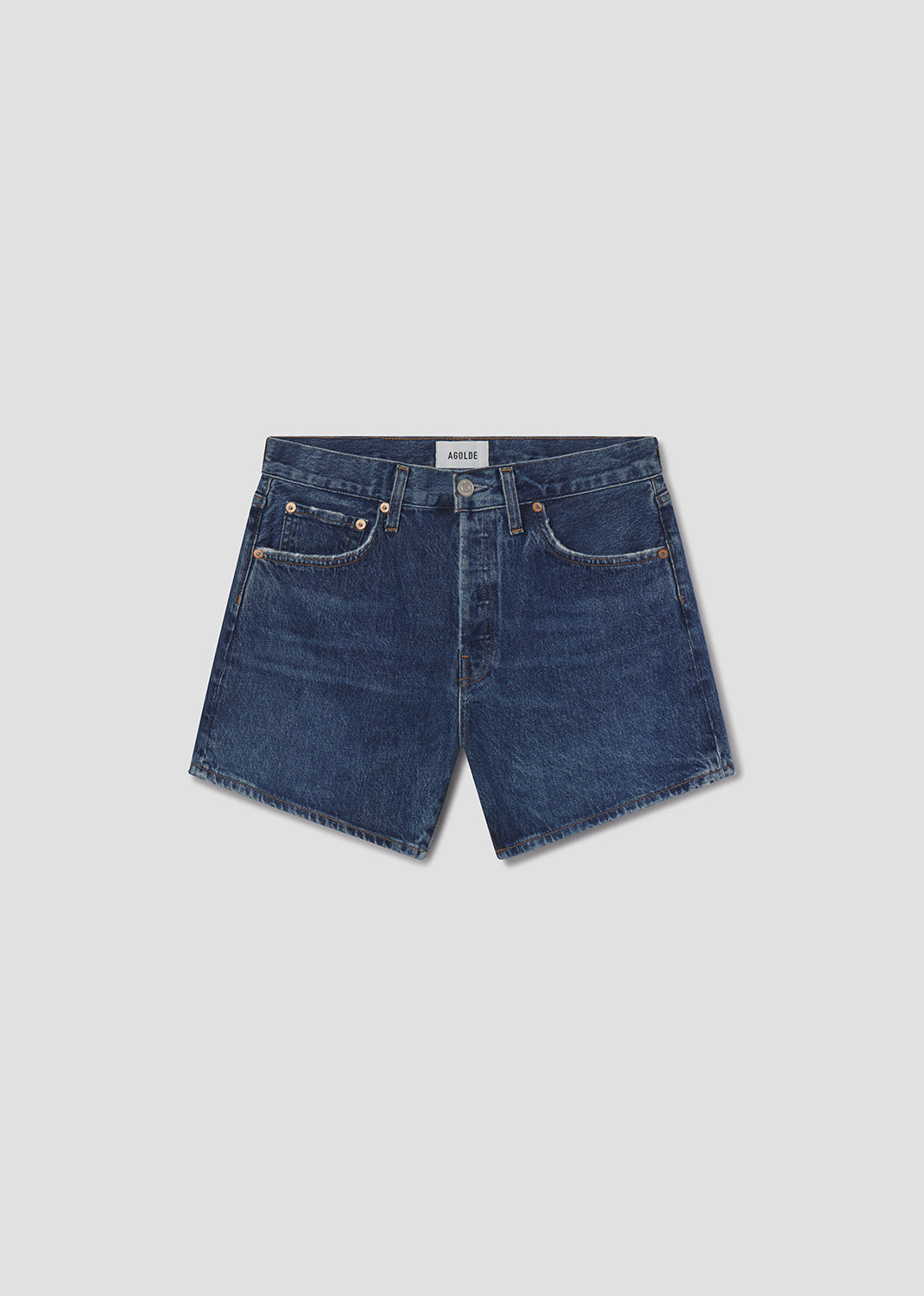 Blue denim shorts on a light gray background