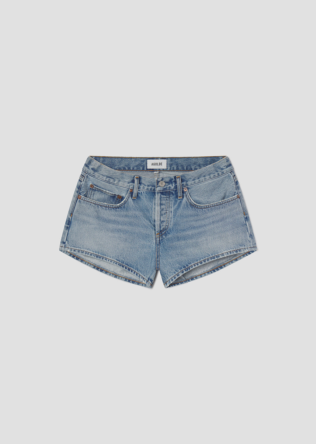 Blue denim shorts on a light gray background