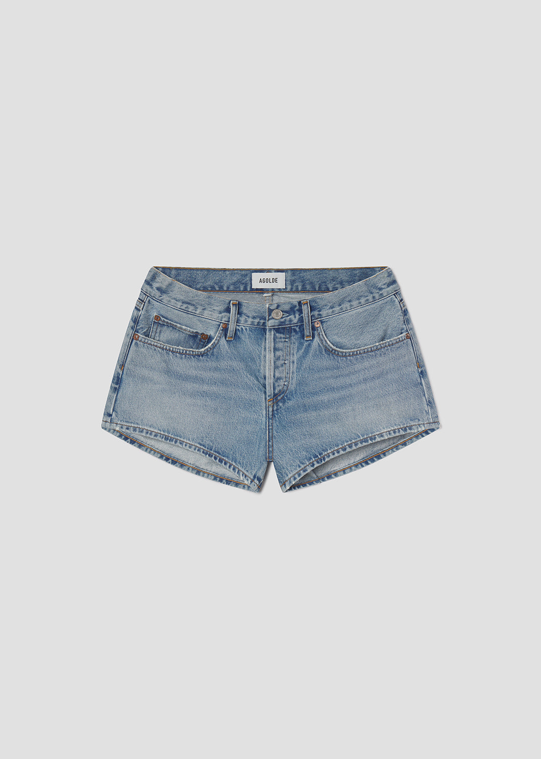 Blue denim shorts on a light gray background