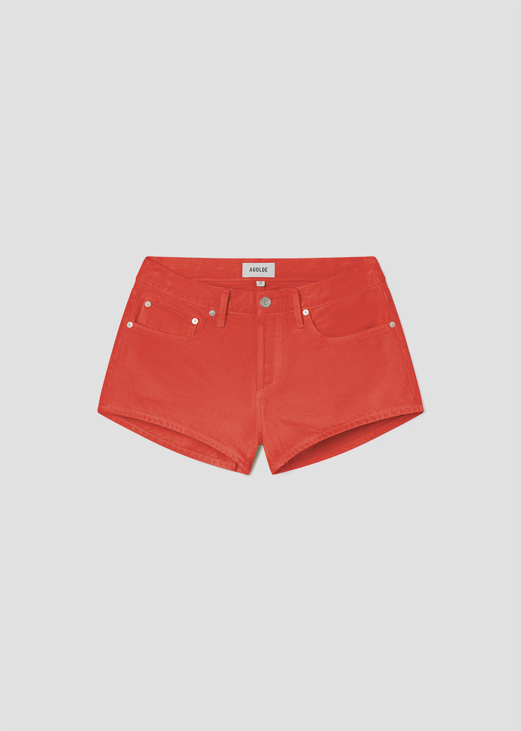Red denim shorts on a light gray background