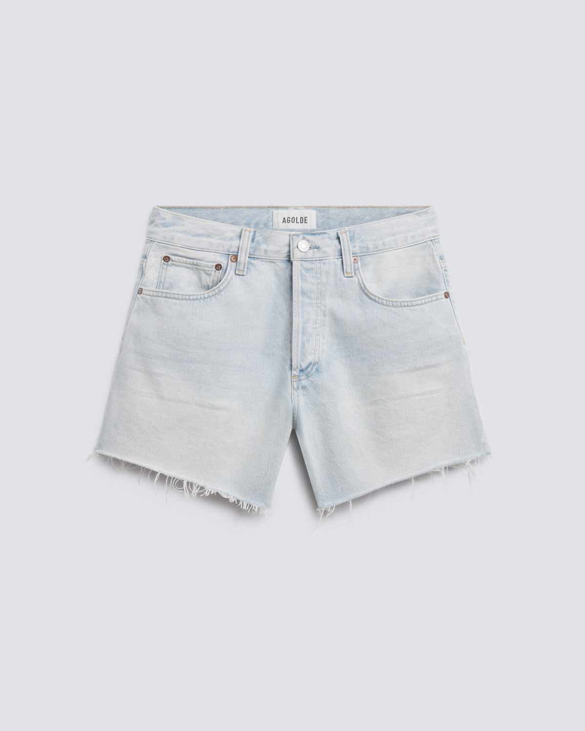 Light-wash denim shorts with a raw, frayed hem and classic five-pocket styling, shown flat on a light gray background.