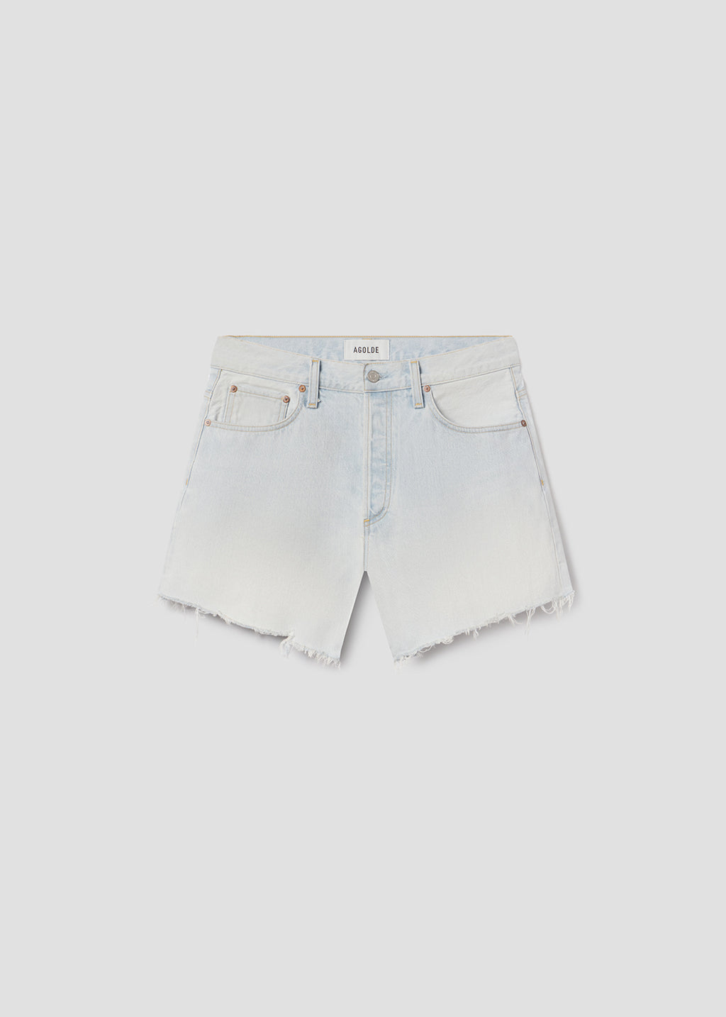 Flat lay of blue shorts on grey background