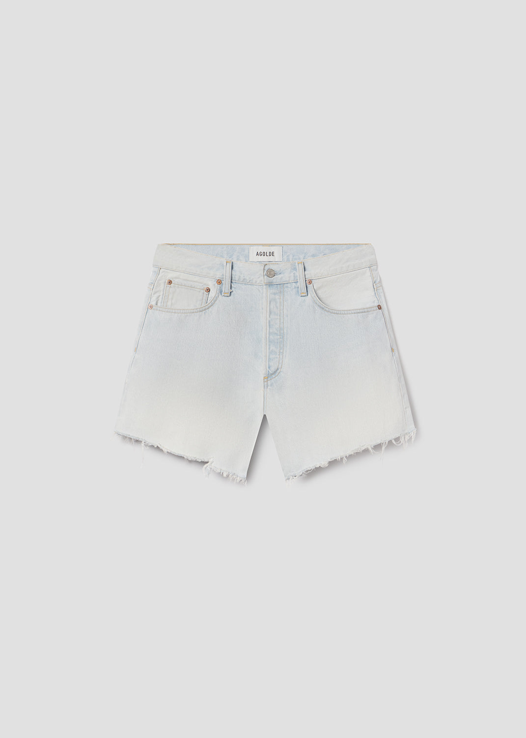 Flat lay of blue shorts on grey background