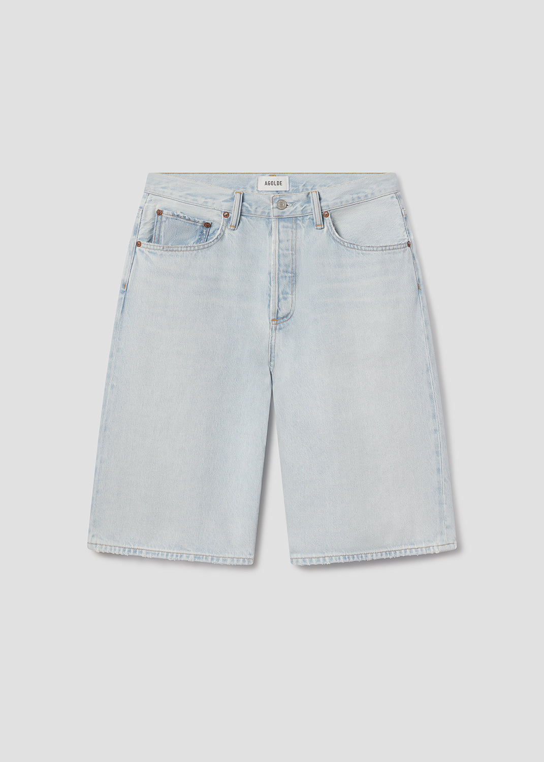 Light blue denim shorts on a light gray background