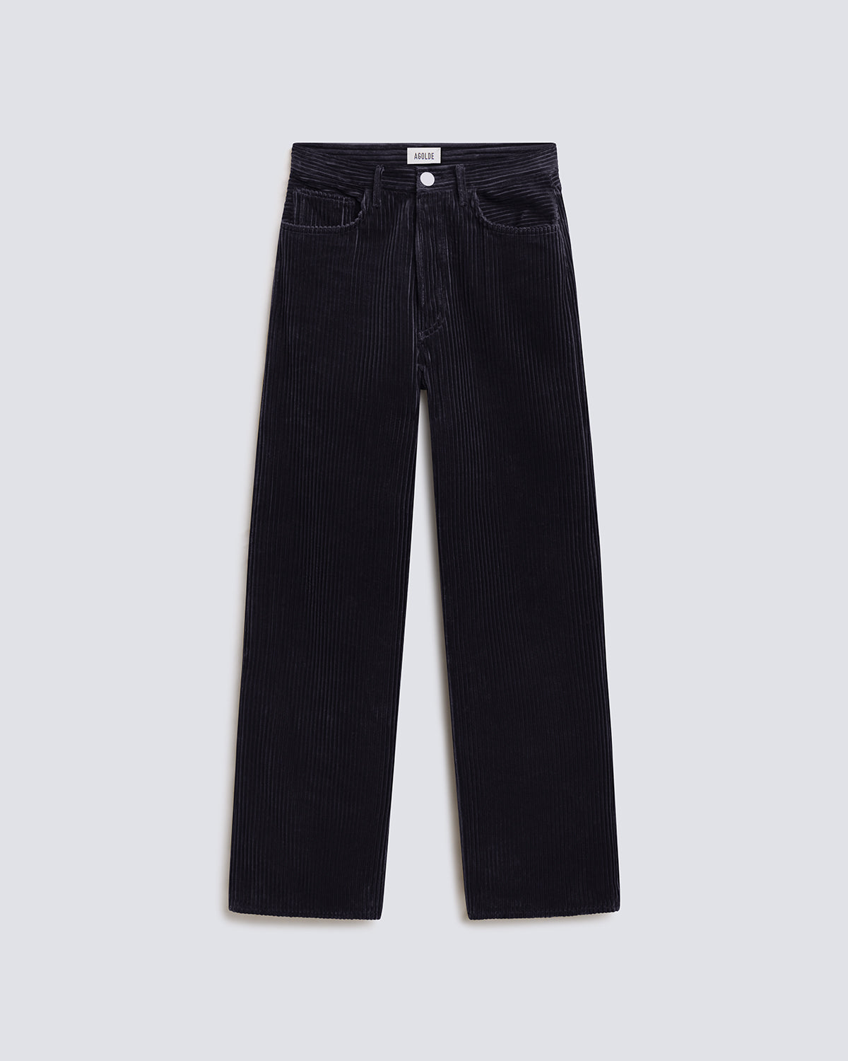 A pair of dark navy corduroy trousers laid flat against a light gray background.